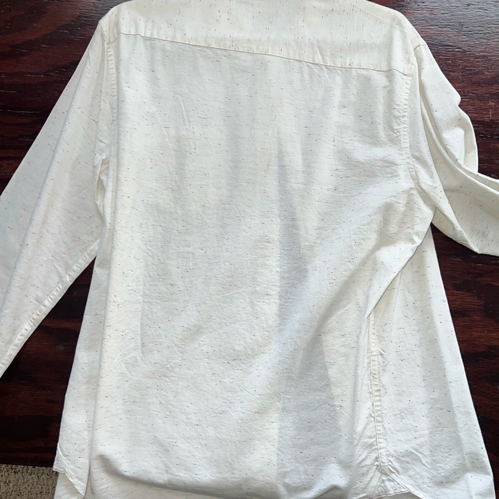 I have here a well cared for used dress shirt. Lightly used like new. White